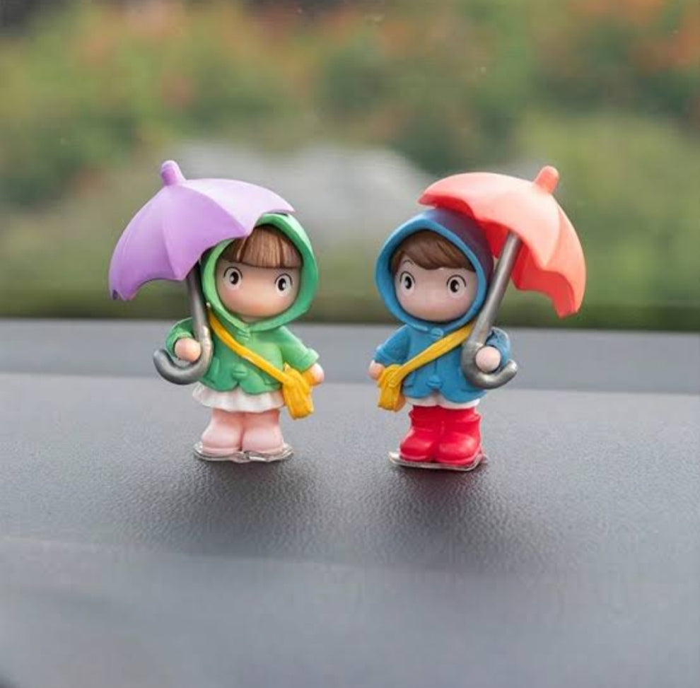 Cute Cartoon couple holding umbrella for car dashboard and home decor